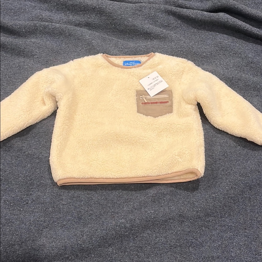 NWT Tokyo Disney Cream Fleece Pullover